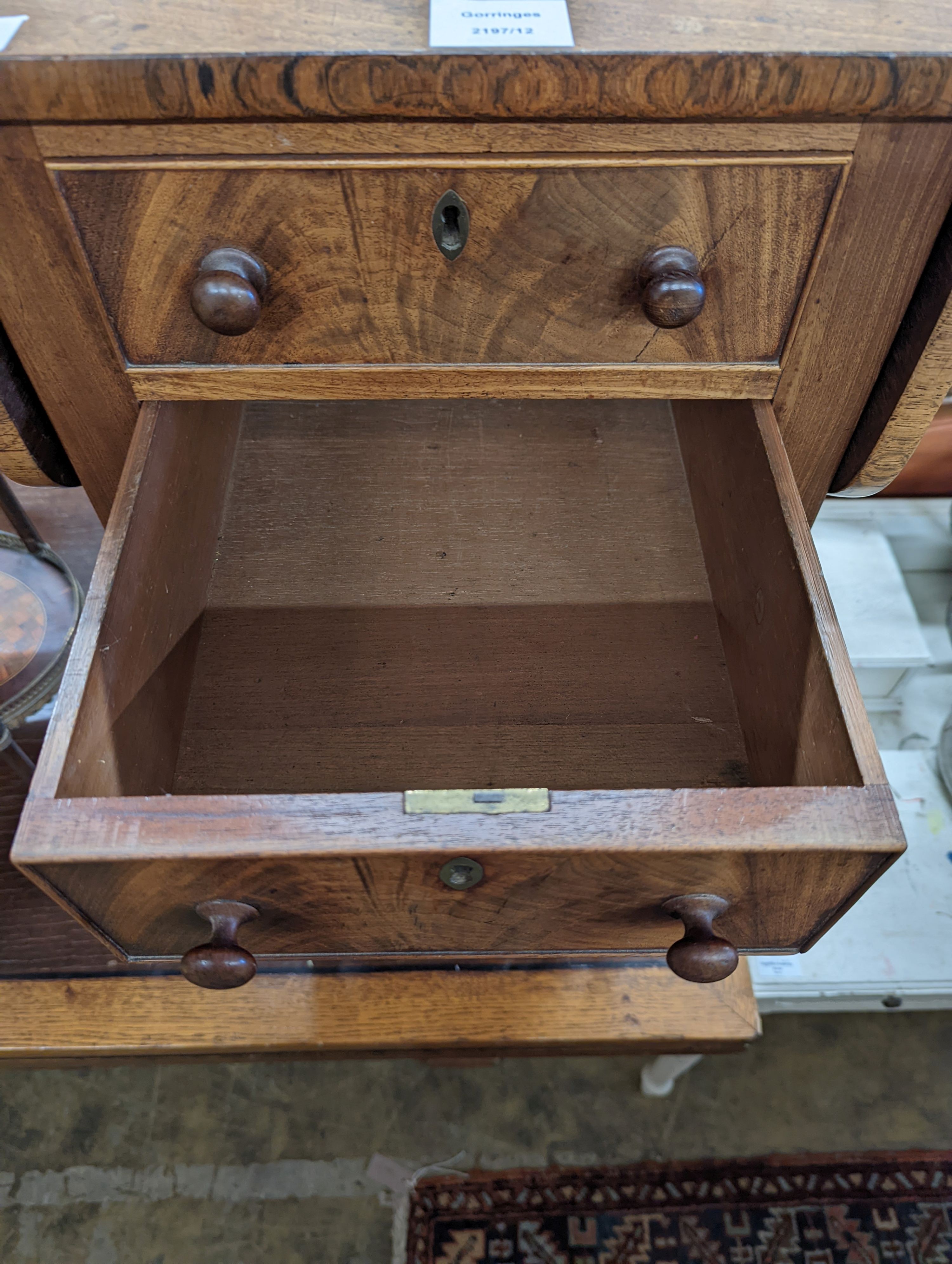 A Regency mahogany drop flap work table, width 38cm, depth 50cm, height 74cm